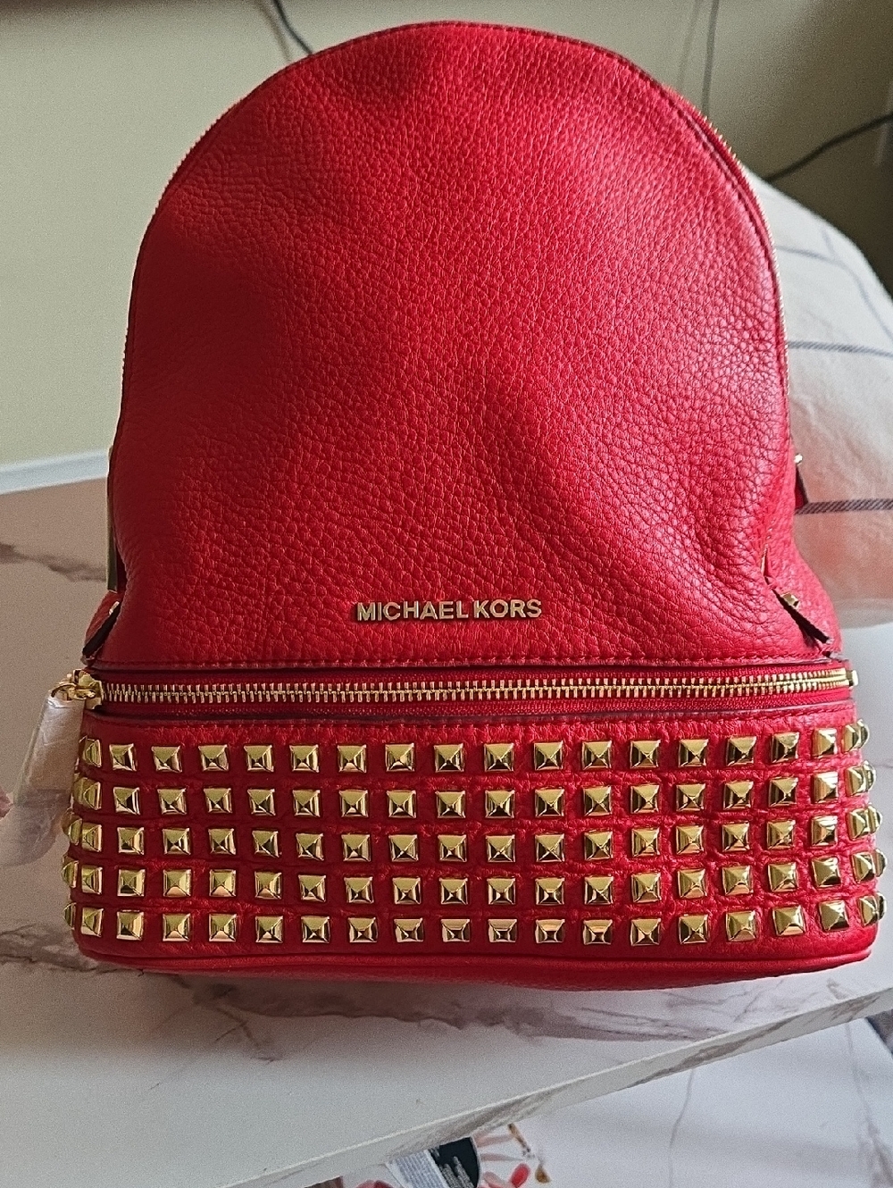 Michael Kors Red Pebbled Leather Backpack with Gold Studs NWT.
